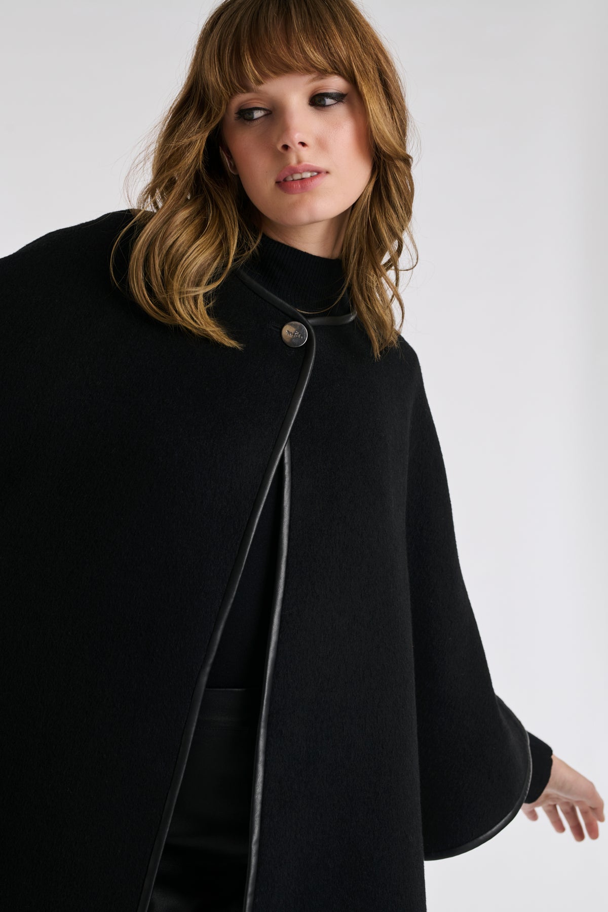 Cape en laine double face