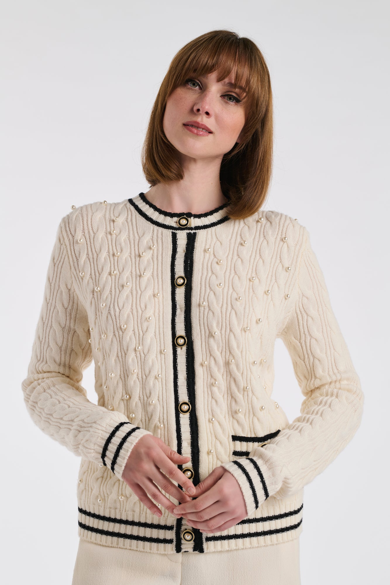 Cardigan en torsades et perles