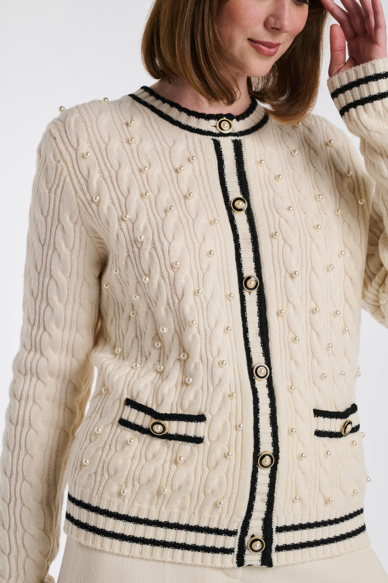 Cardigan en torsades et perles