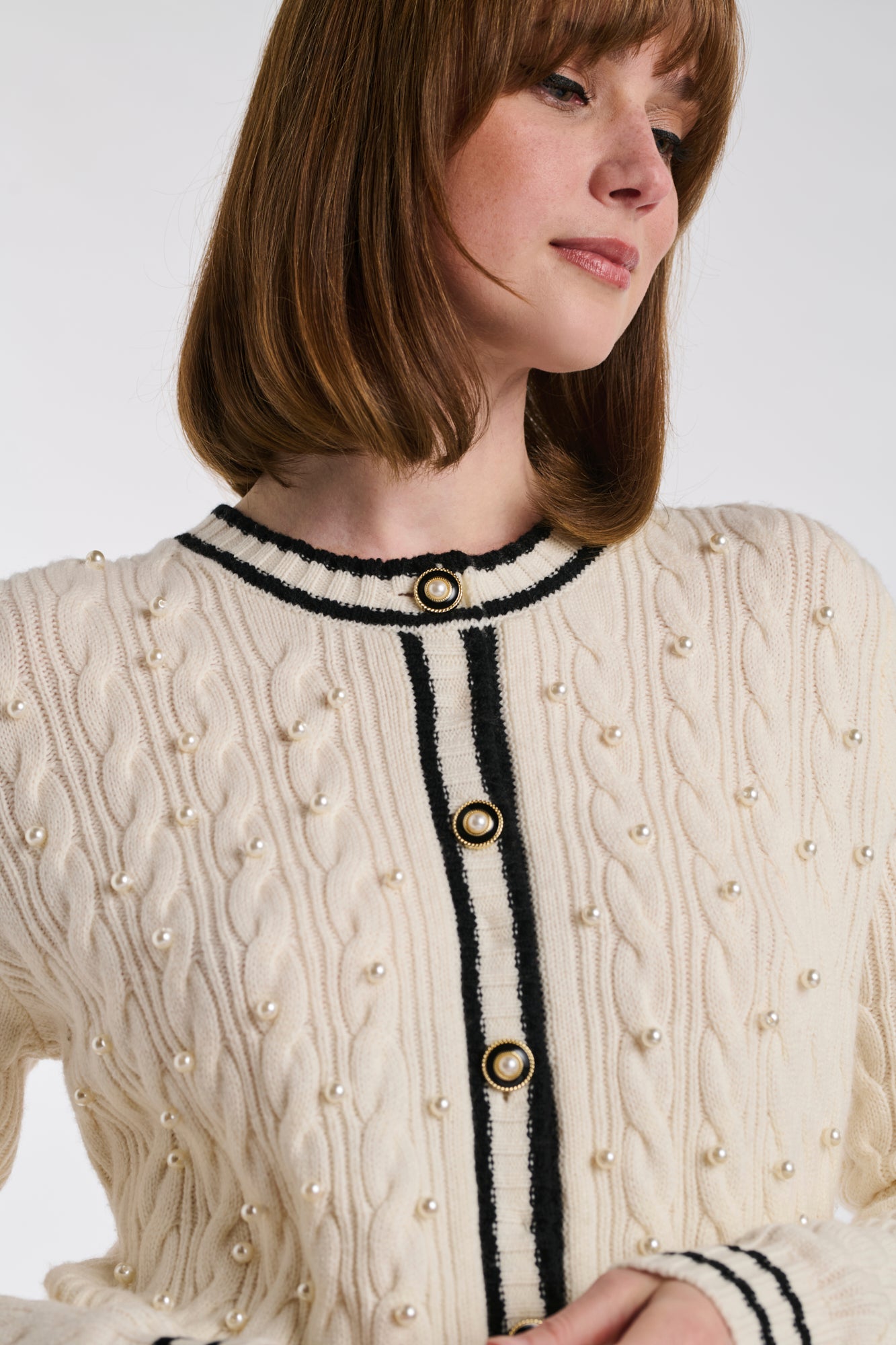 Cardigan en torsades et perles