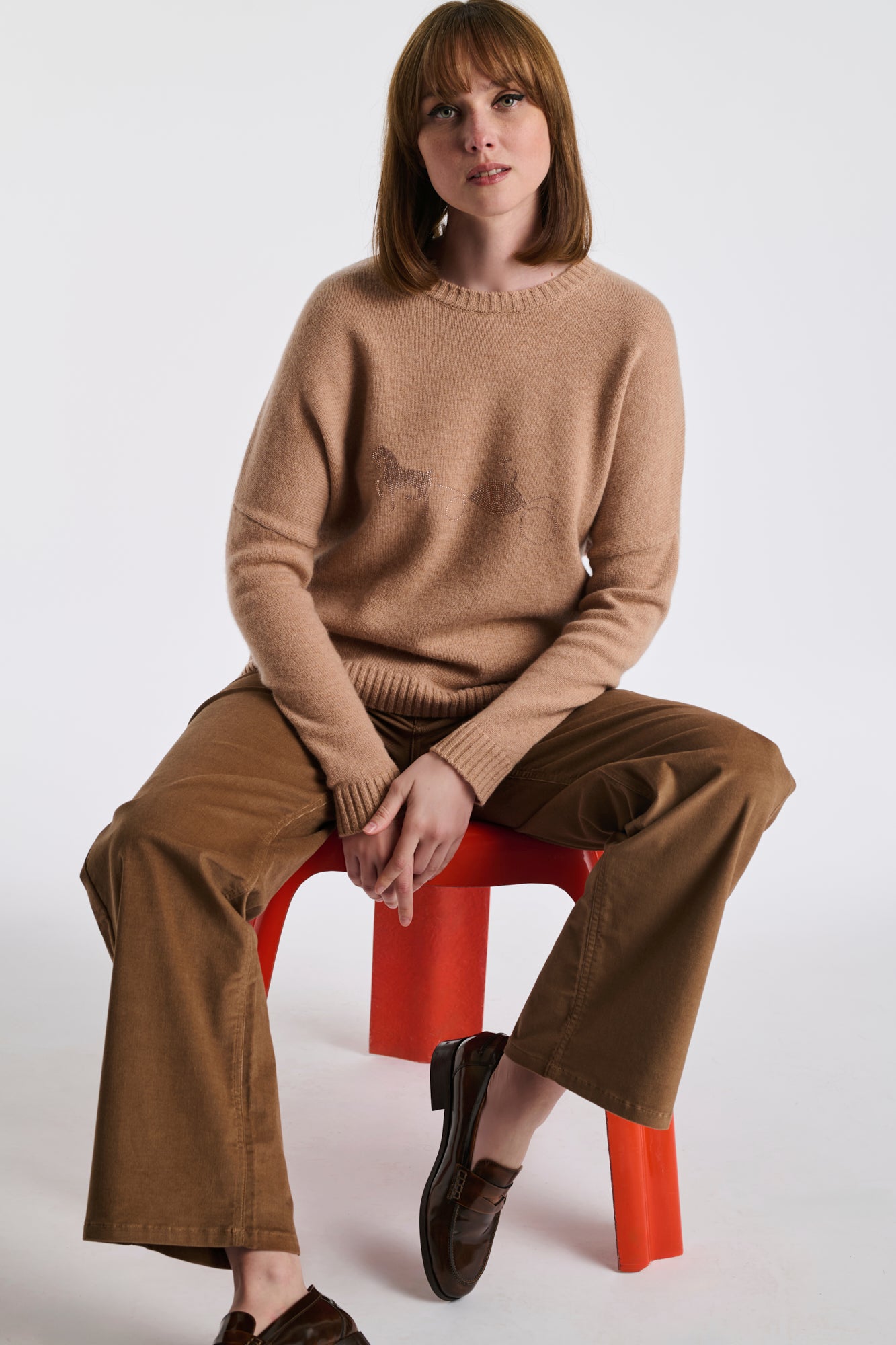 Pull en cachemire à logo strass