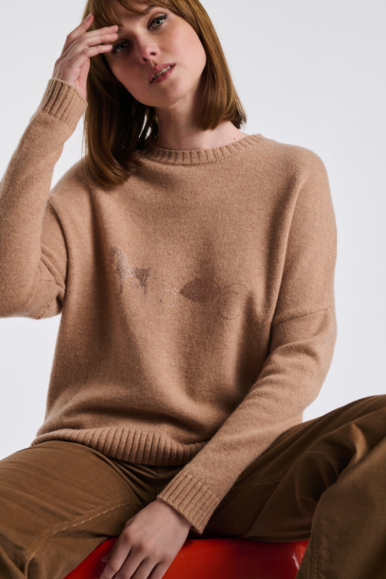 Pull en cachemire à logo strass