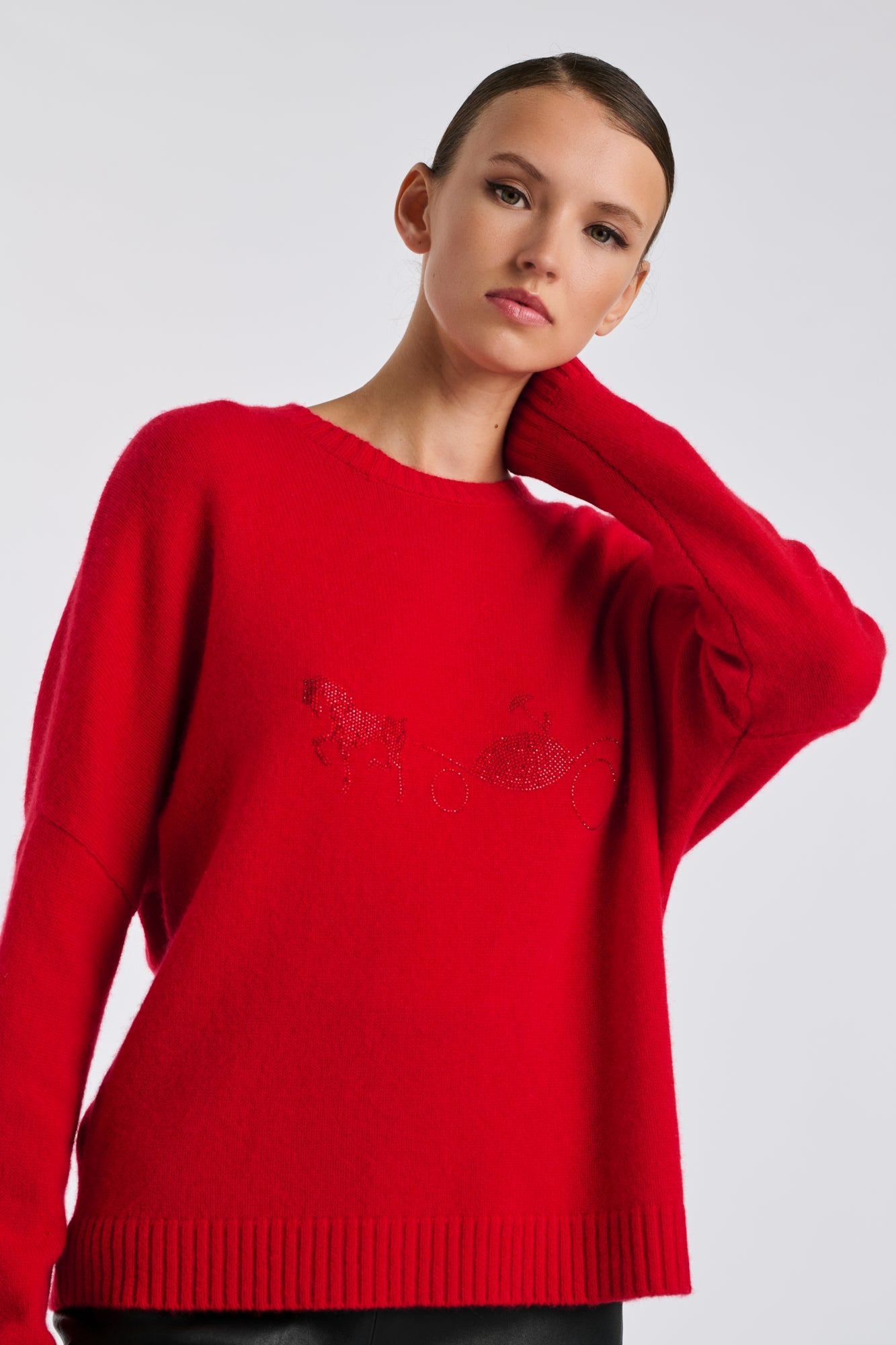 Pull en cachemire à logo strass