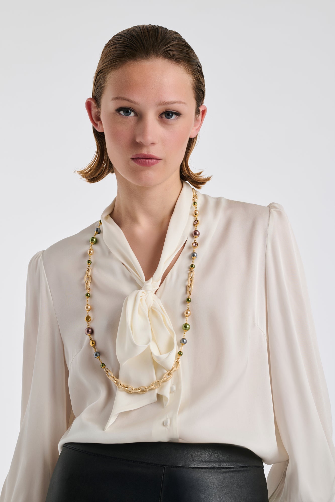 Long chain and pearl necklace