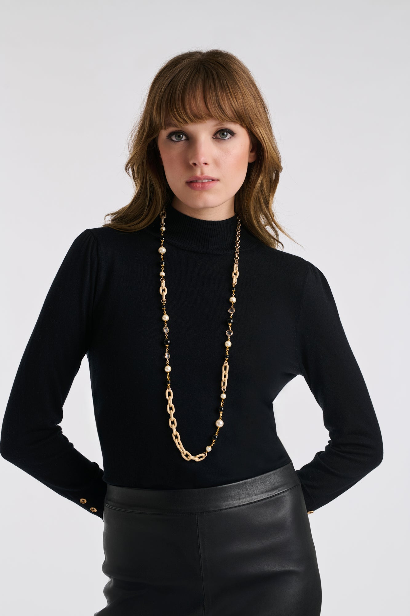 Long chain and pearl necklace