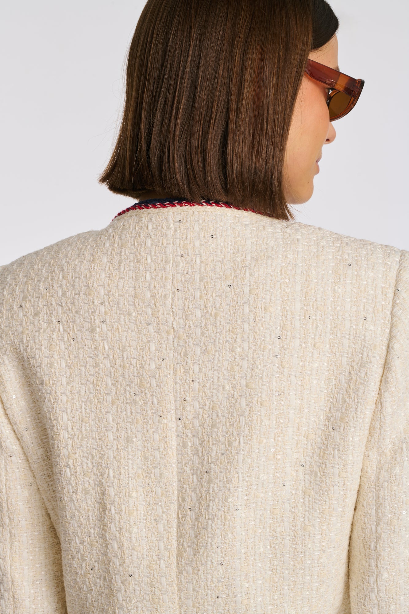 Long tweed jacket with braided trim