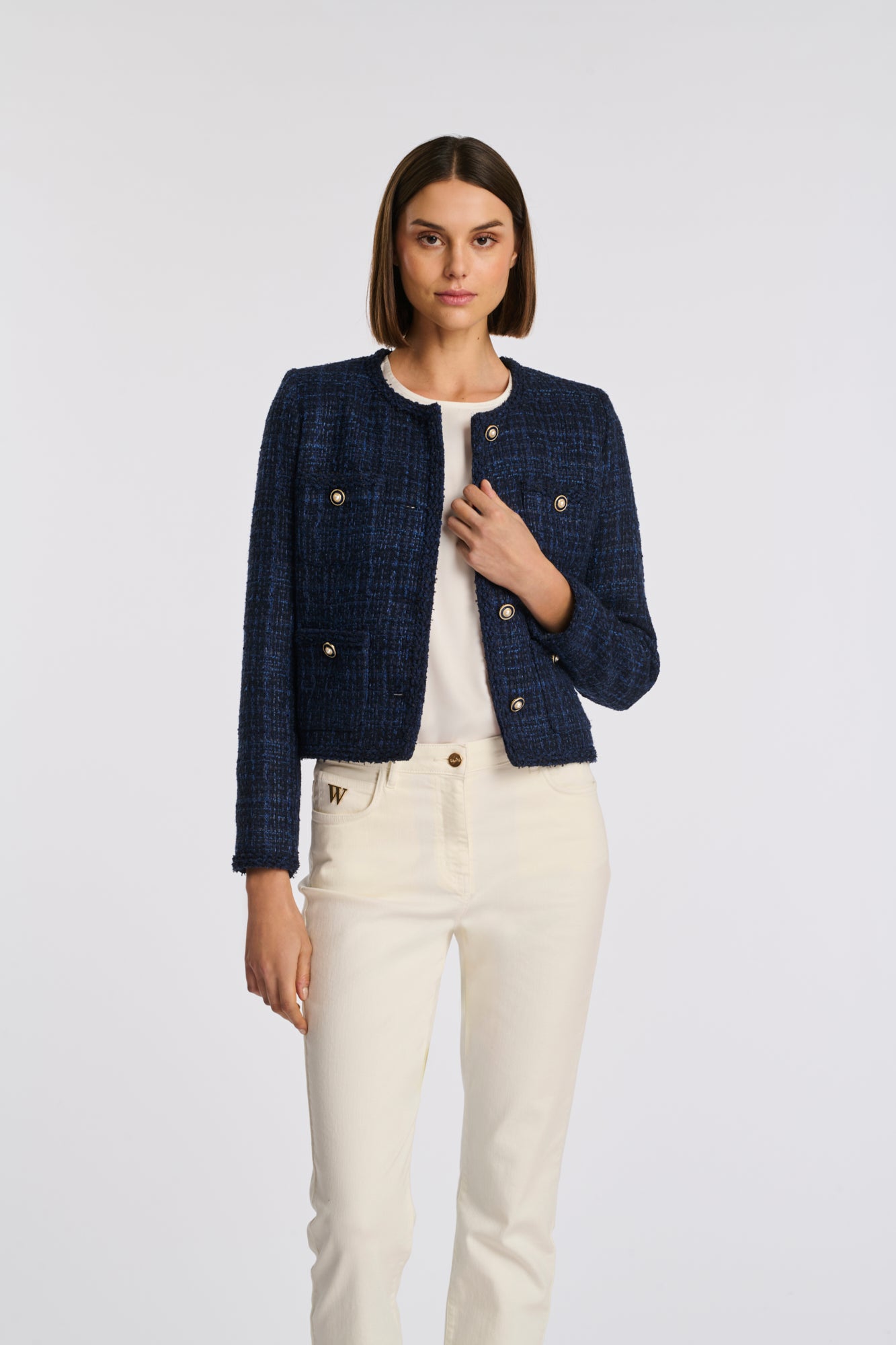 Veste en tweed galonnée
