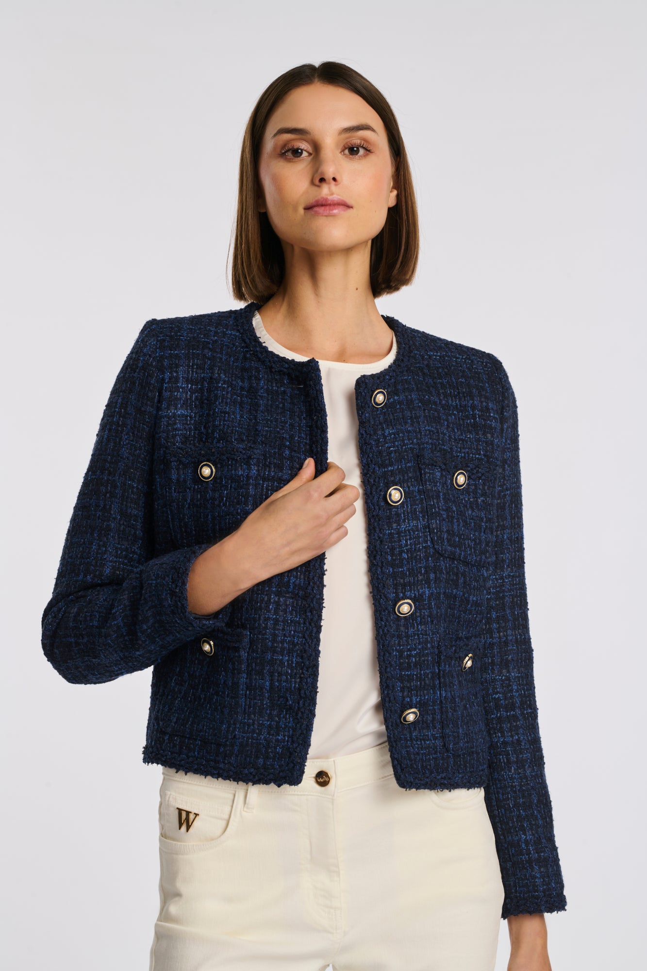 Veste en tweed galonnée