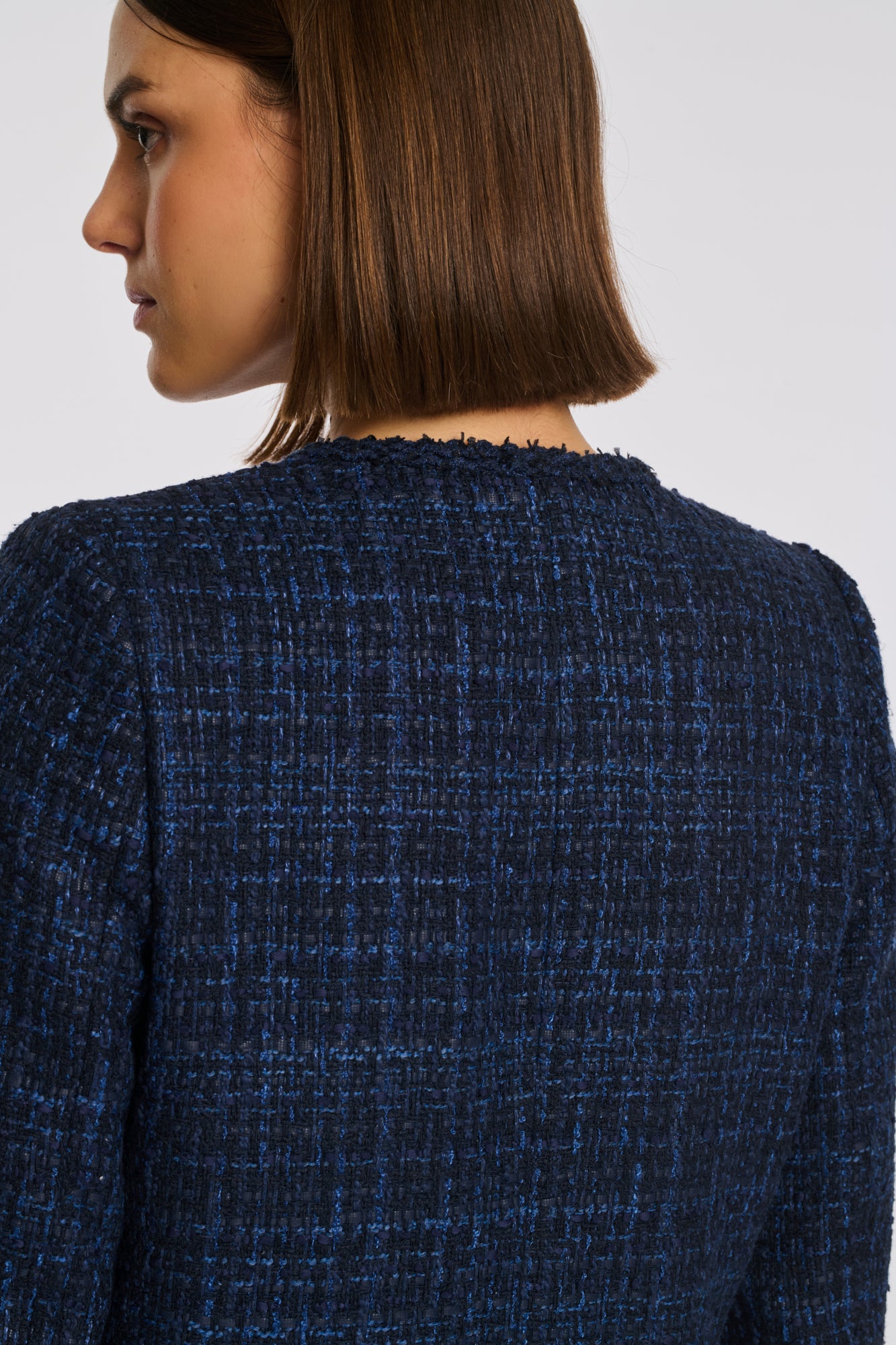 Veste en tweed galonnée