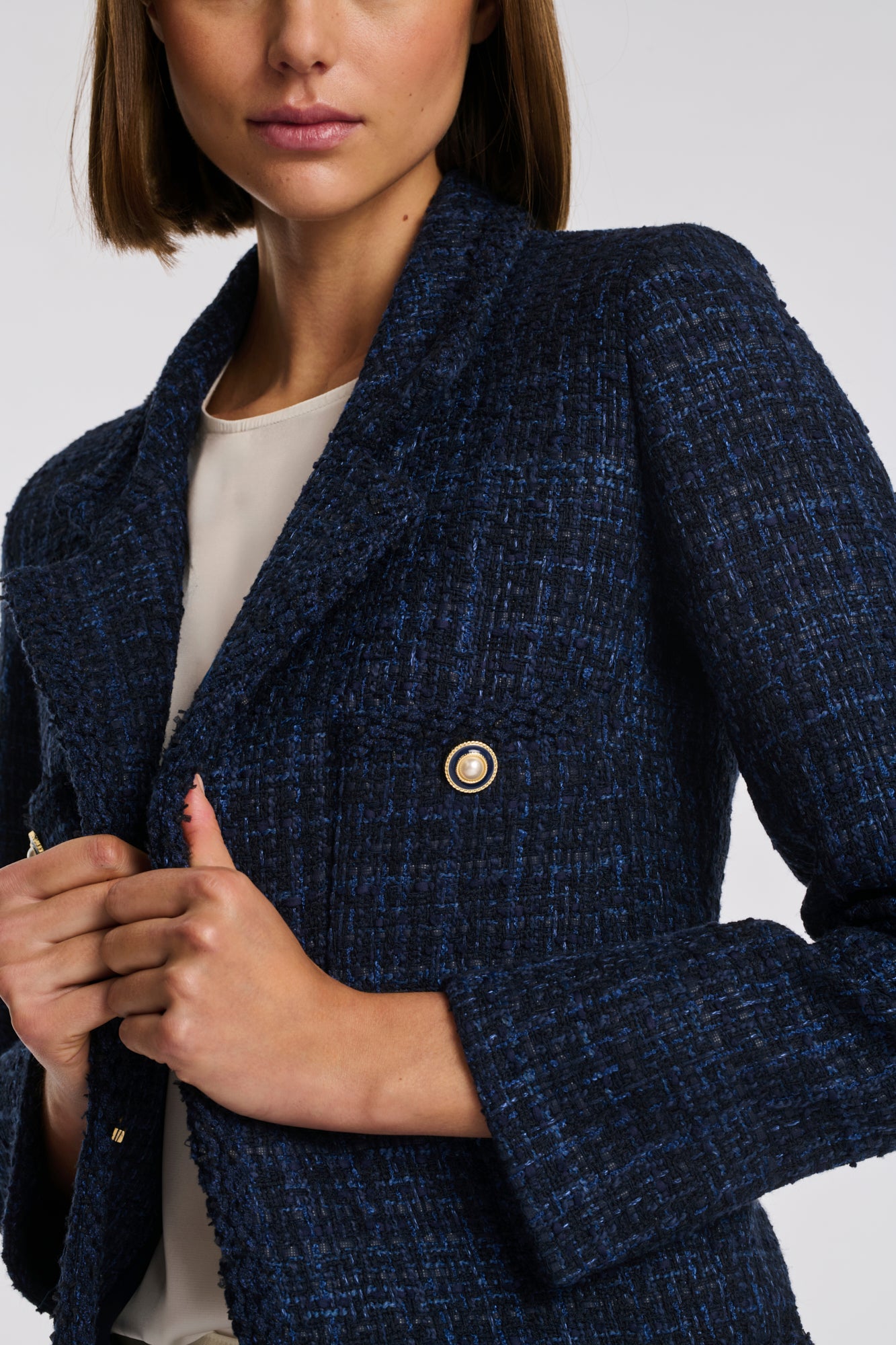 Blazer en tweed galonné