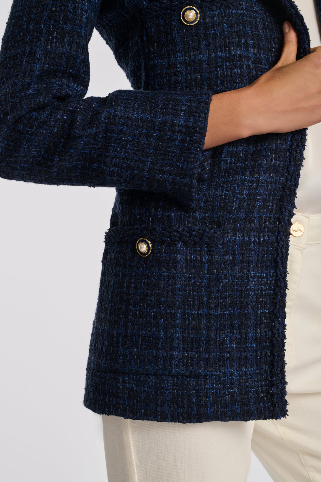 Blazer en tweed galonné