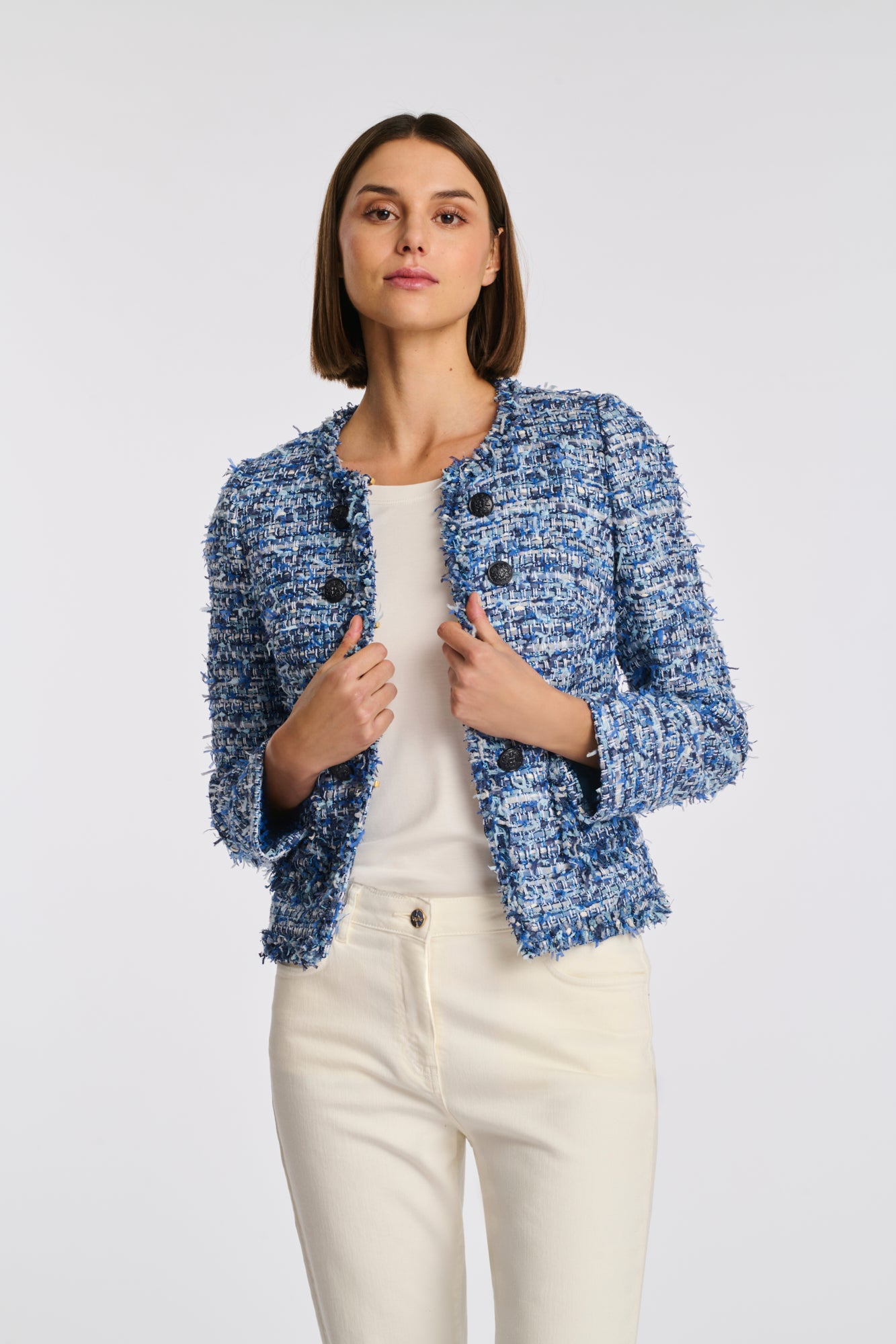 Veste en tweed frangée