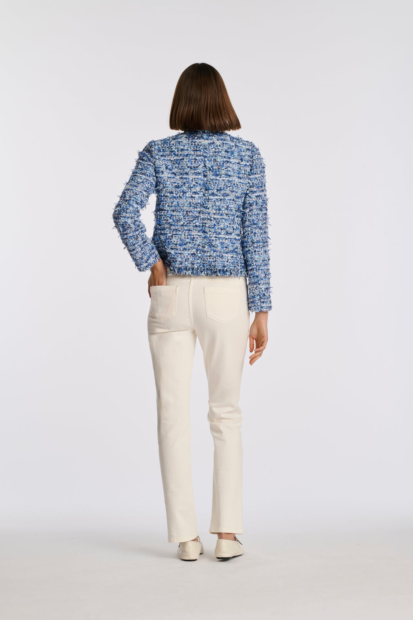 Veste en tweed frangée