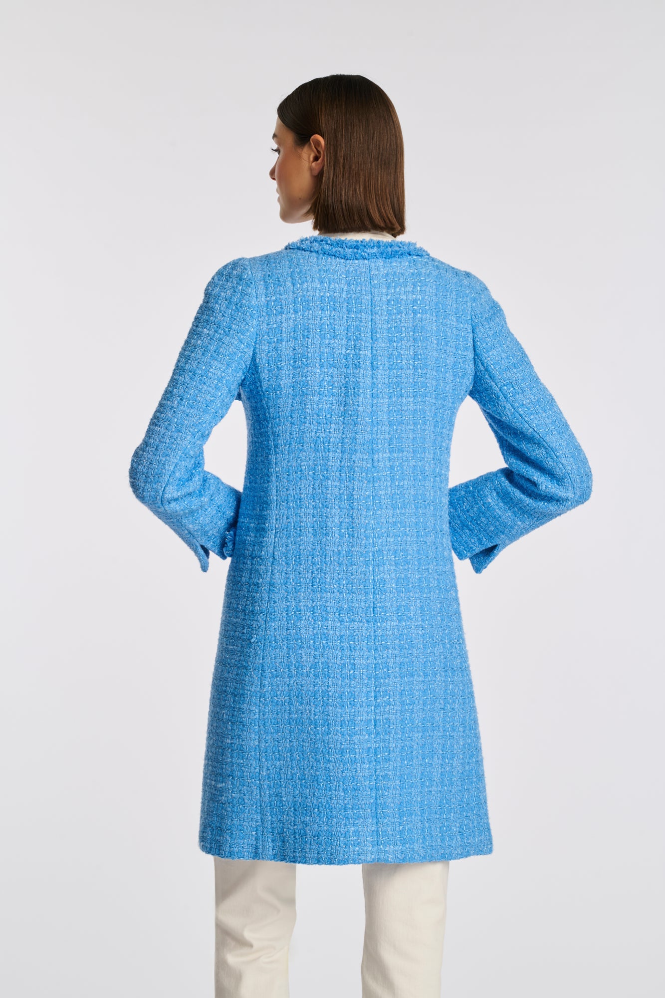 Manteau en tweed frangé