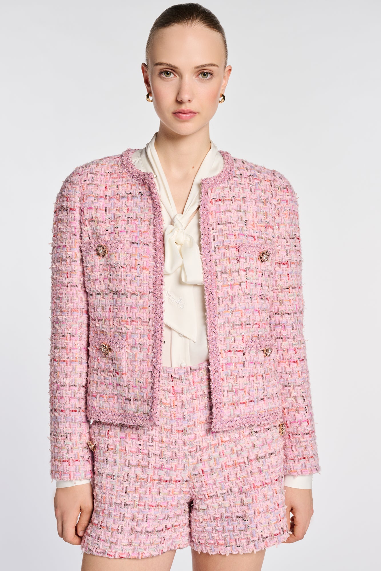 Veste en tweed pastel galonnée