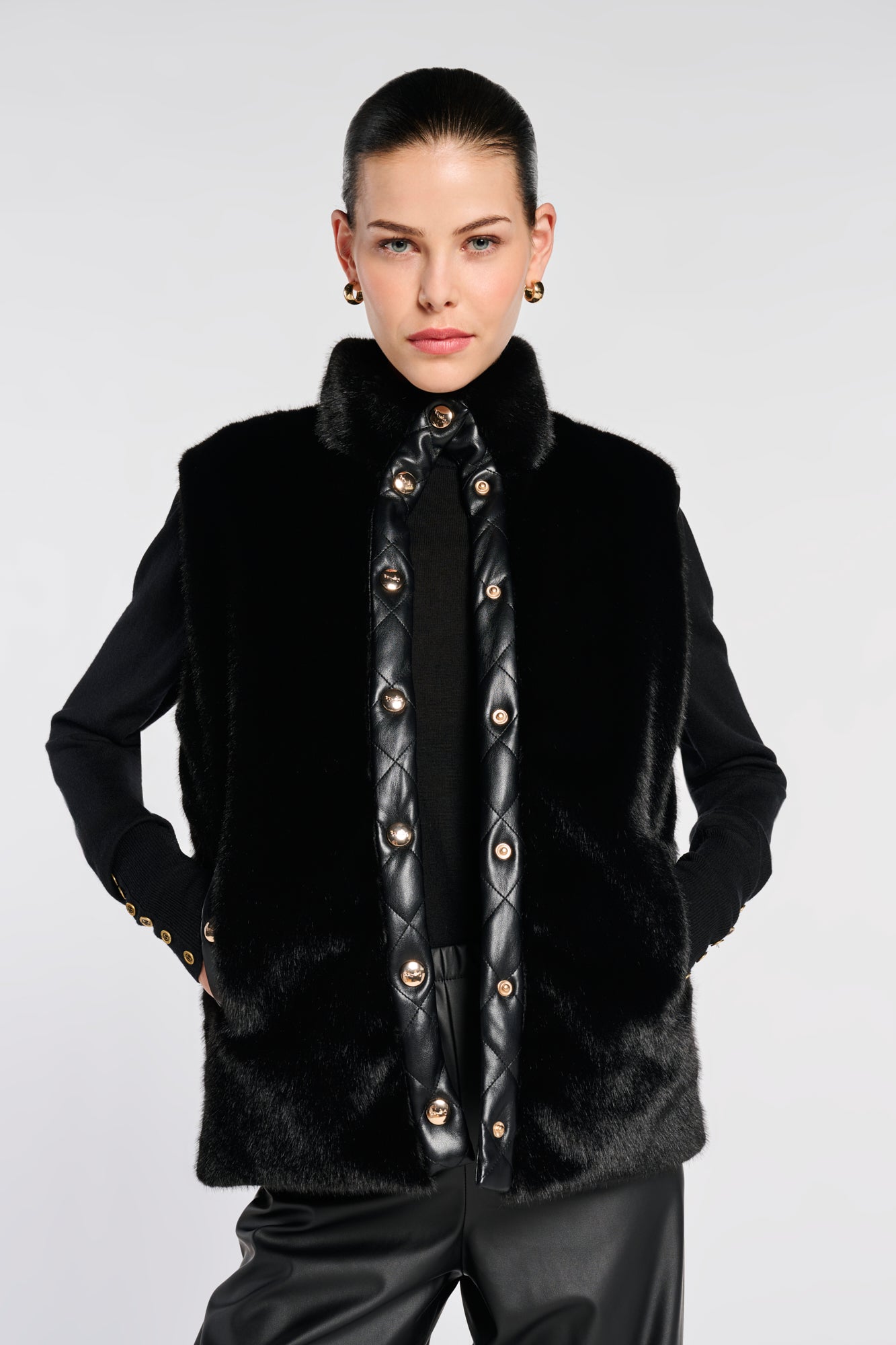 Sleeveless dual-material jacket