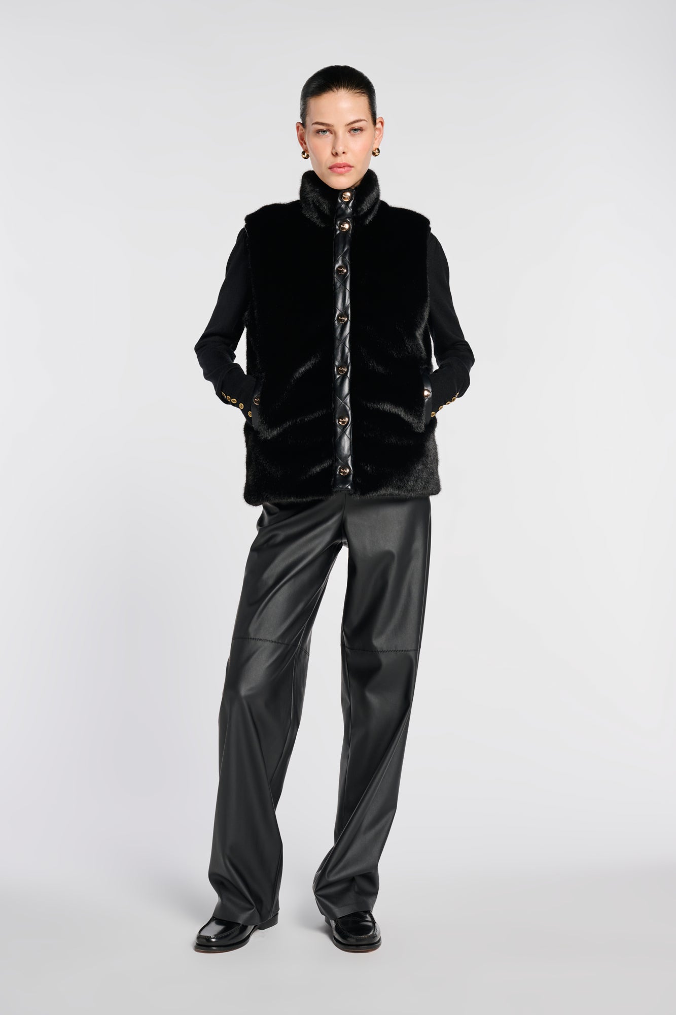 Sleeveless dual-material jacket