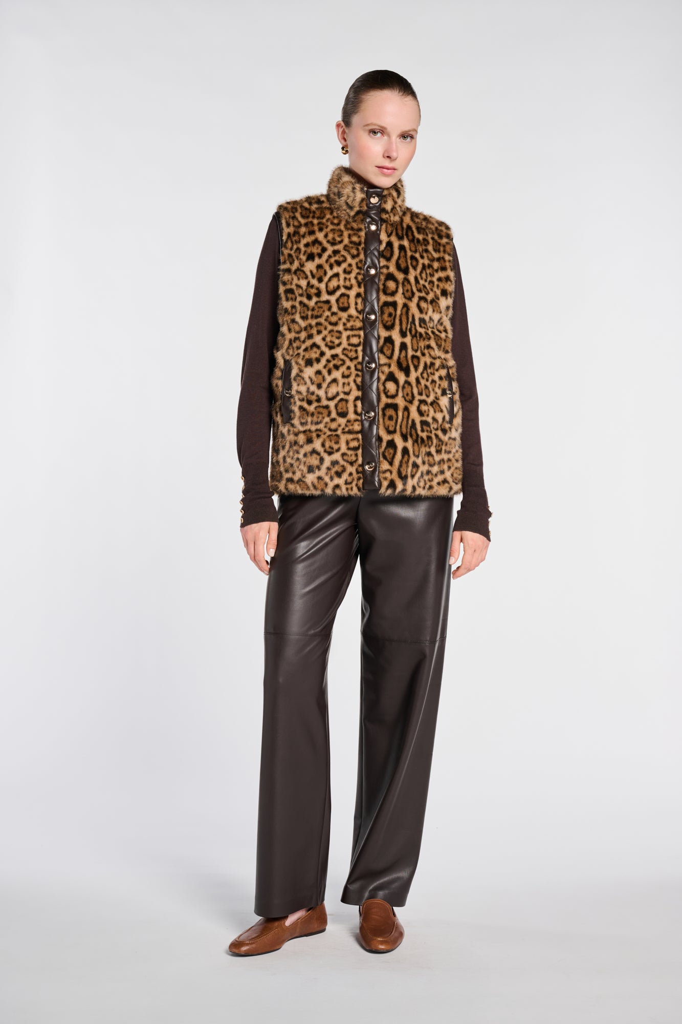 Sleeveless dual-material jacket