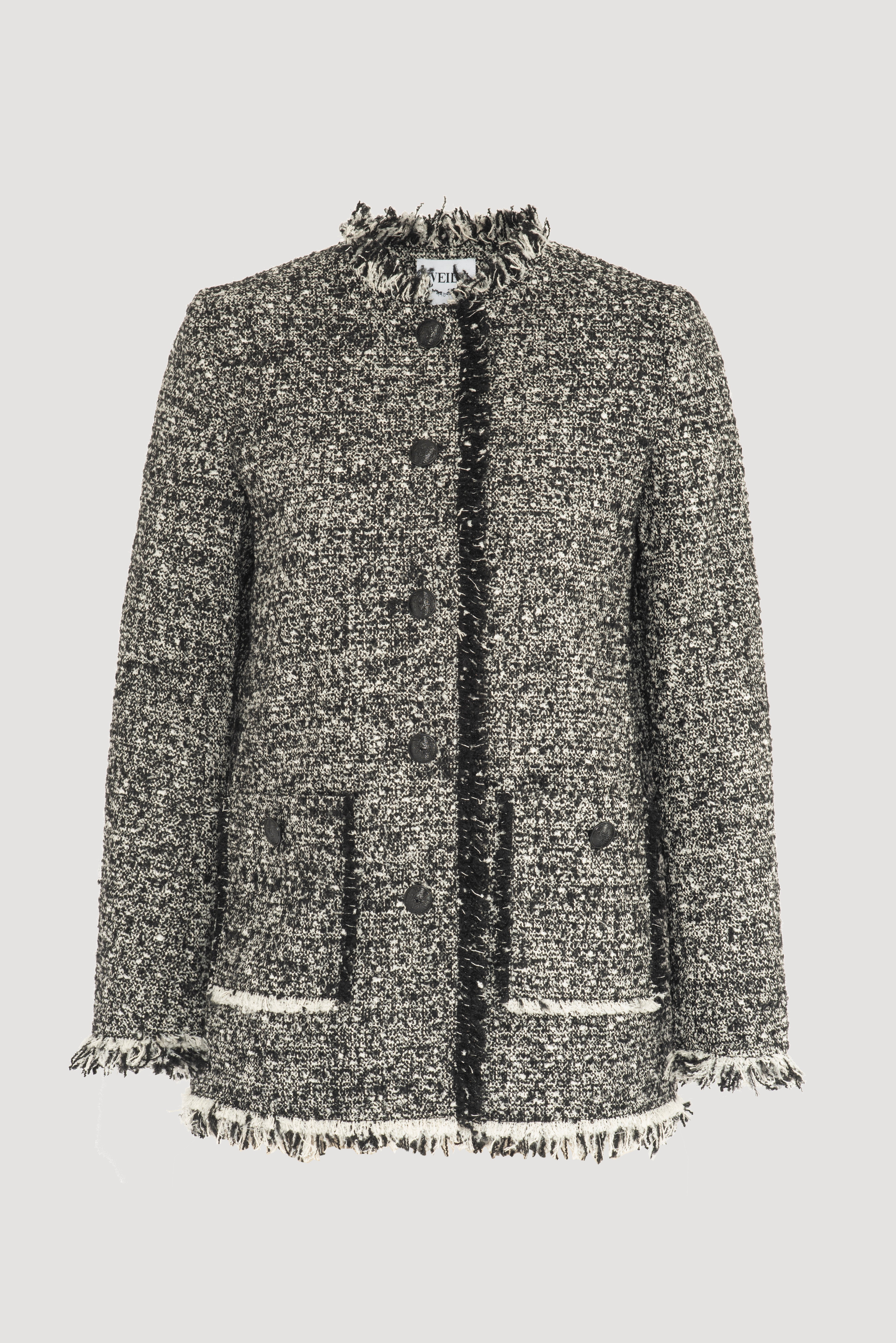 Veste longue en tweed frangée