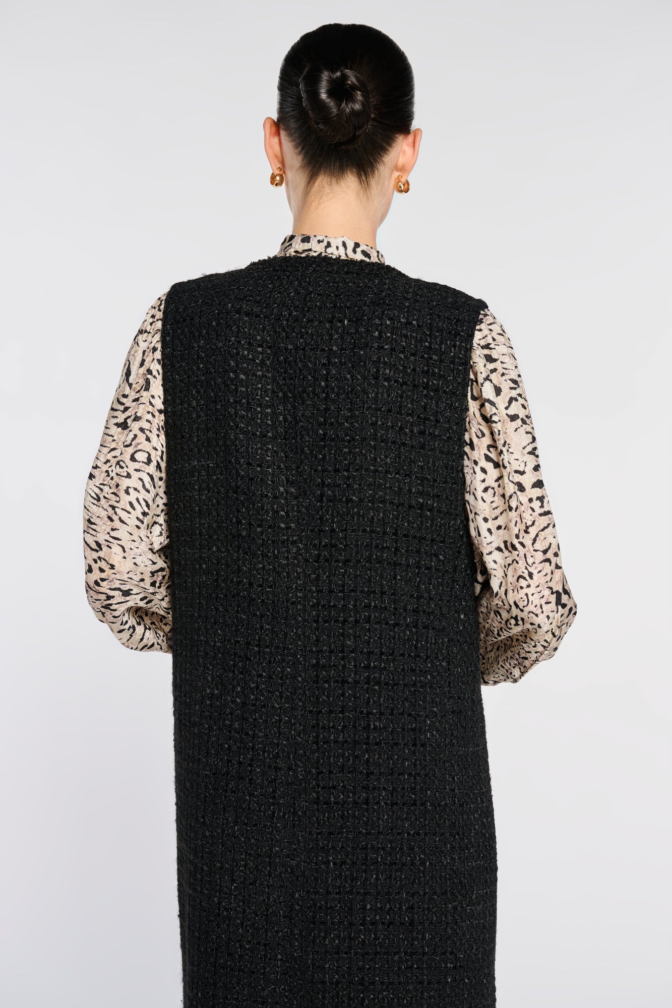 Veste longue sans manche en tweed
