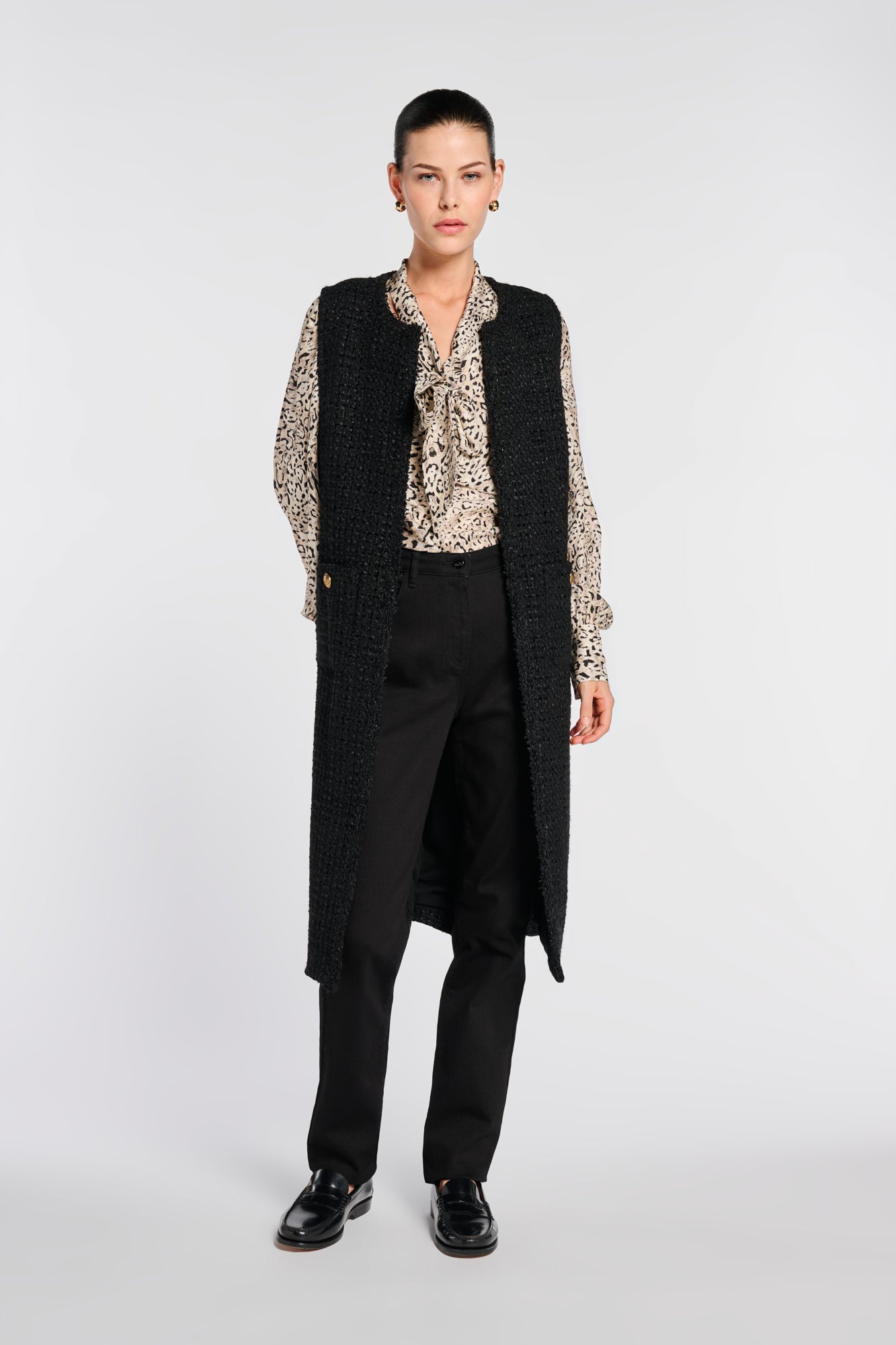 Veste longue sans manche en tweed