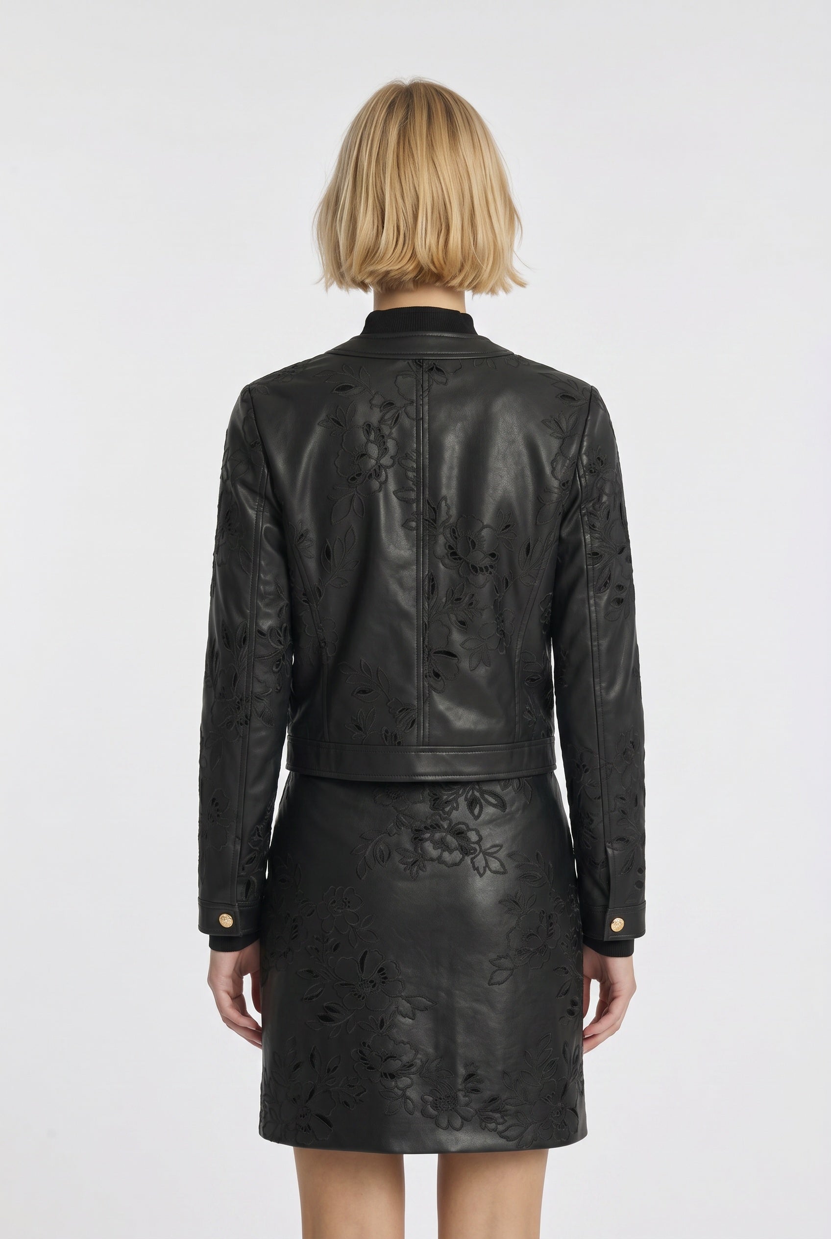 Embroidered faux leather skirt