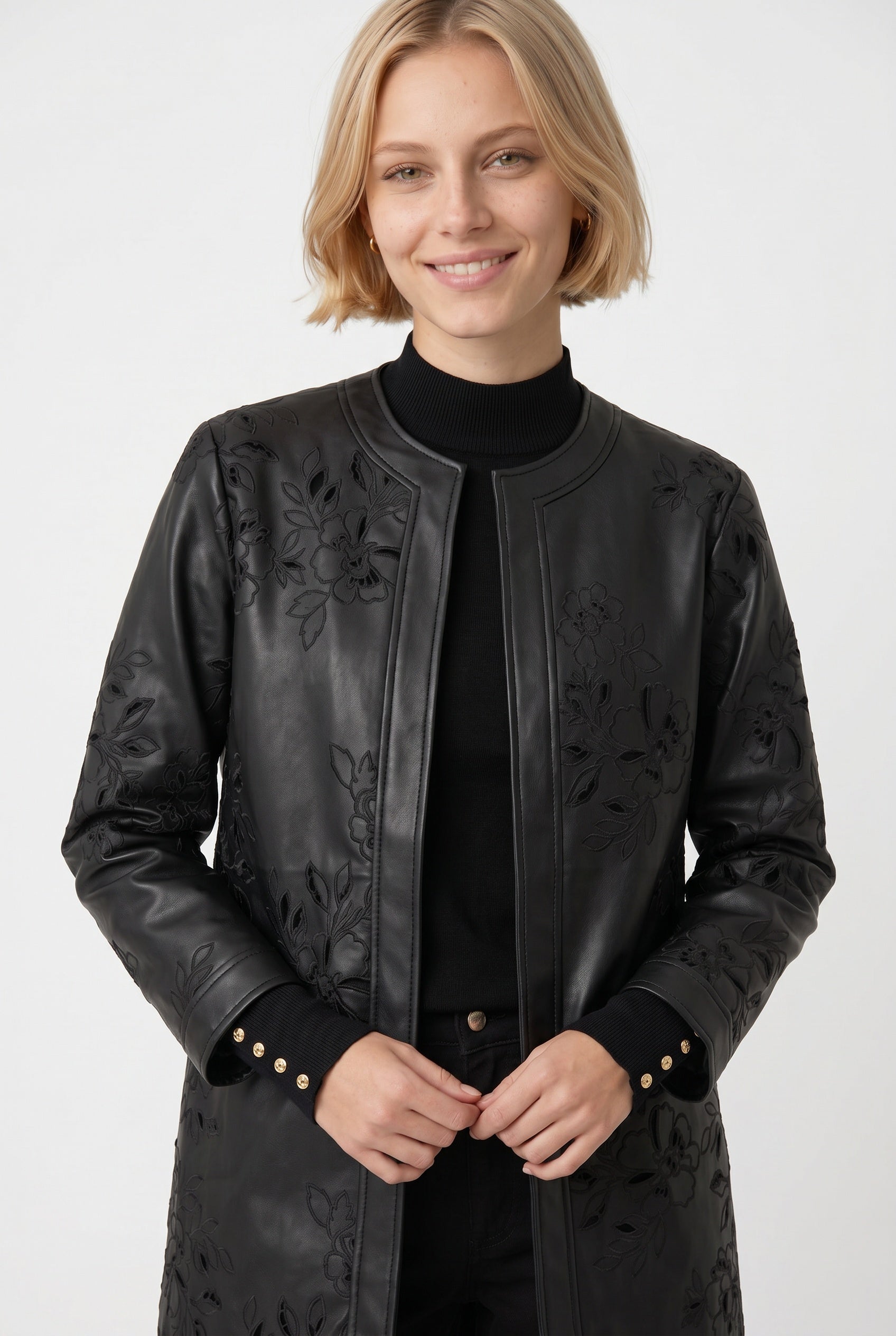Embroidered faux leather coat
