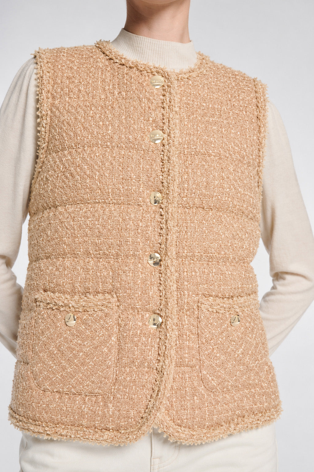Sleeveless tweed puffer jacket