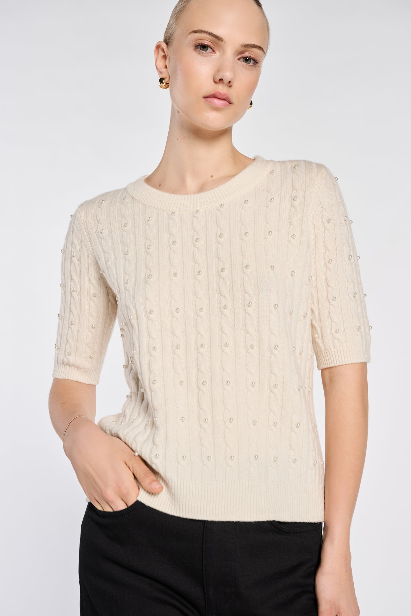 Cable-knit sweater with beads
