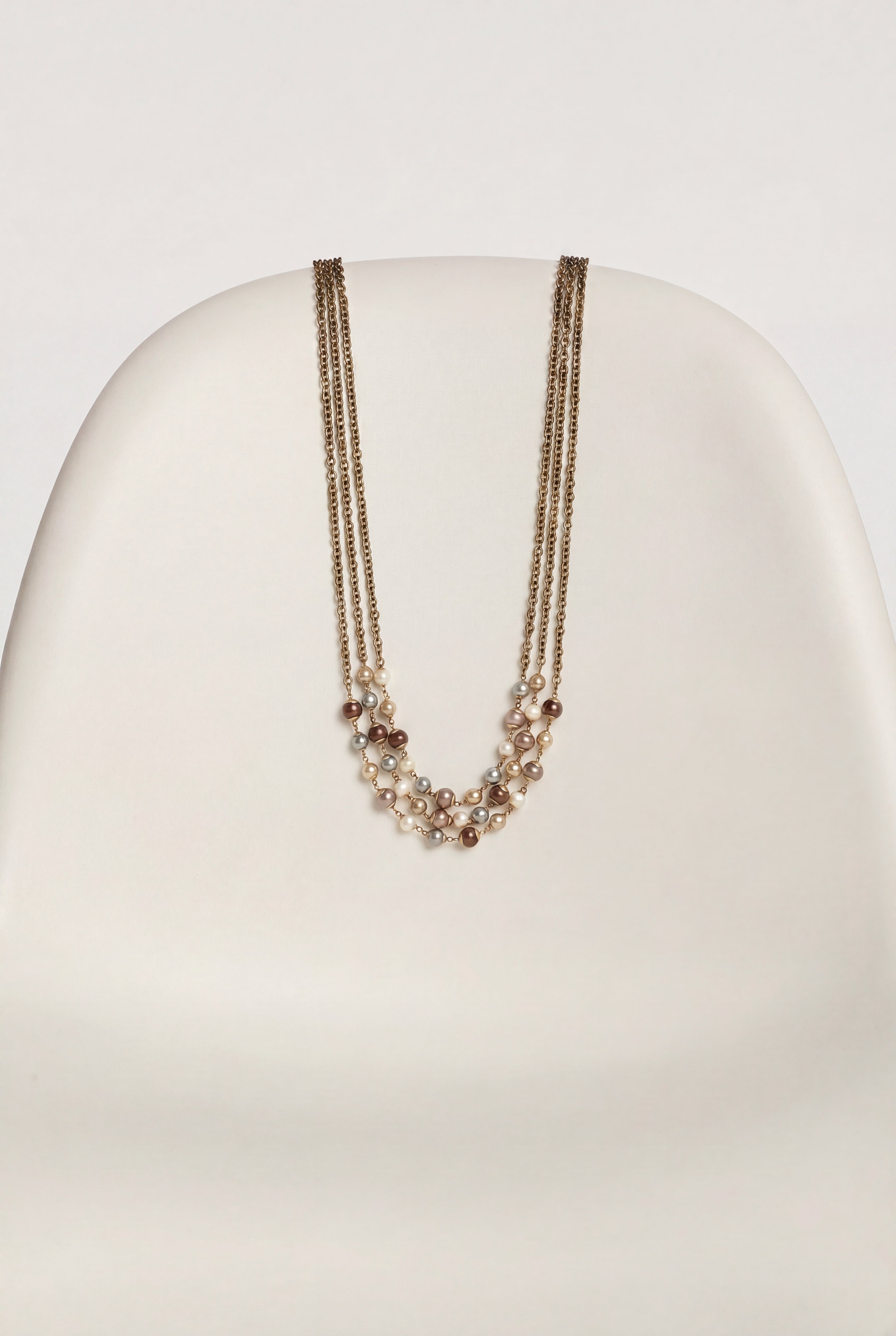Triple-strand necklace with chain and beads
