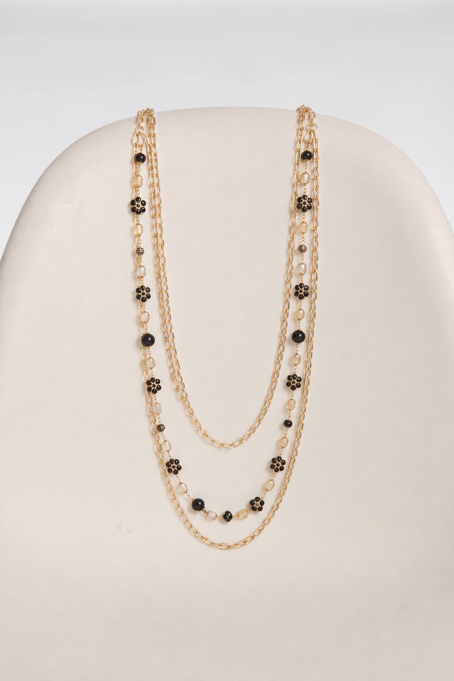 Triple-strand necklace with chain and beads