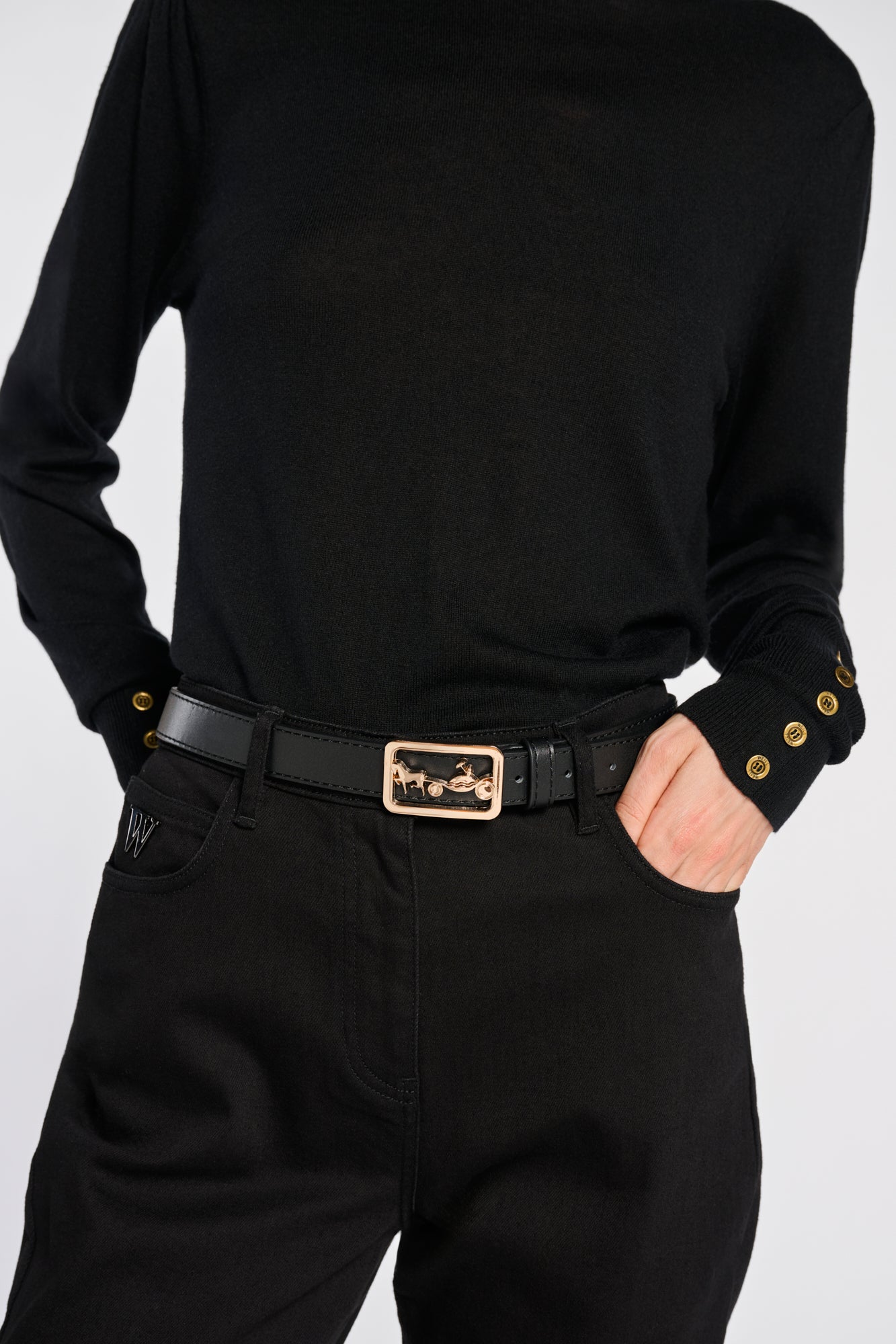 Leather belt with a carriage-style buckle