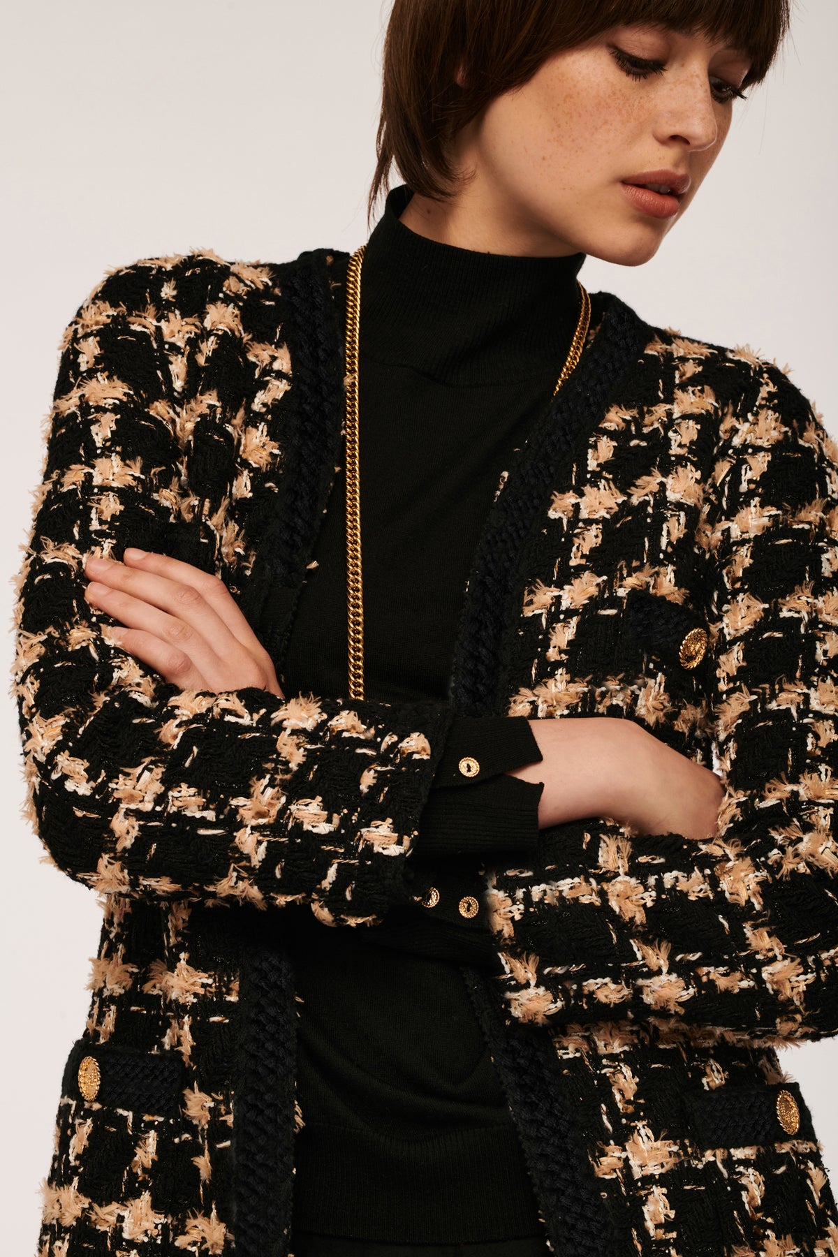 Veste longue en tweed à carreaux