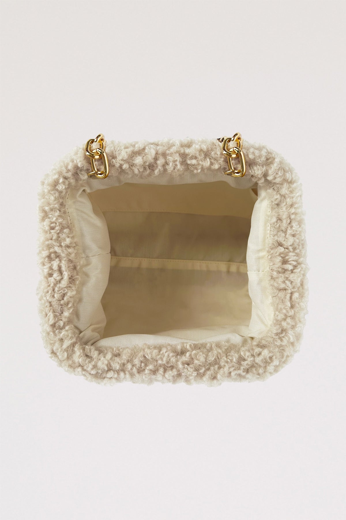 Pochette bouclée écru