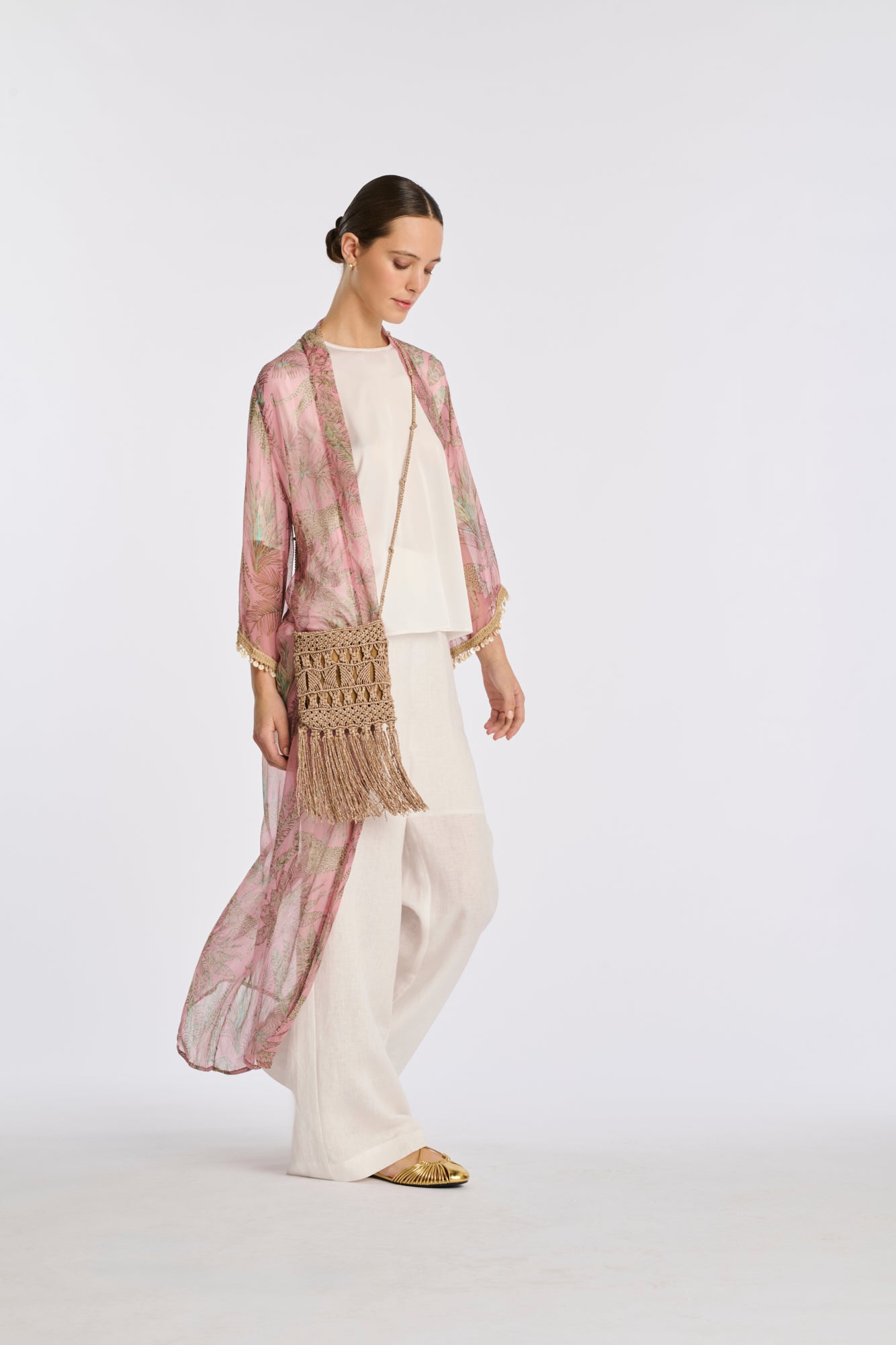 Iridescent crochet clutch bag