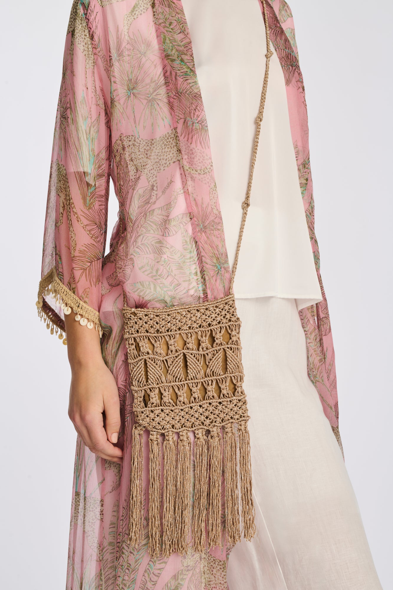 Iridescent crochet clutch bag