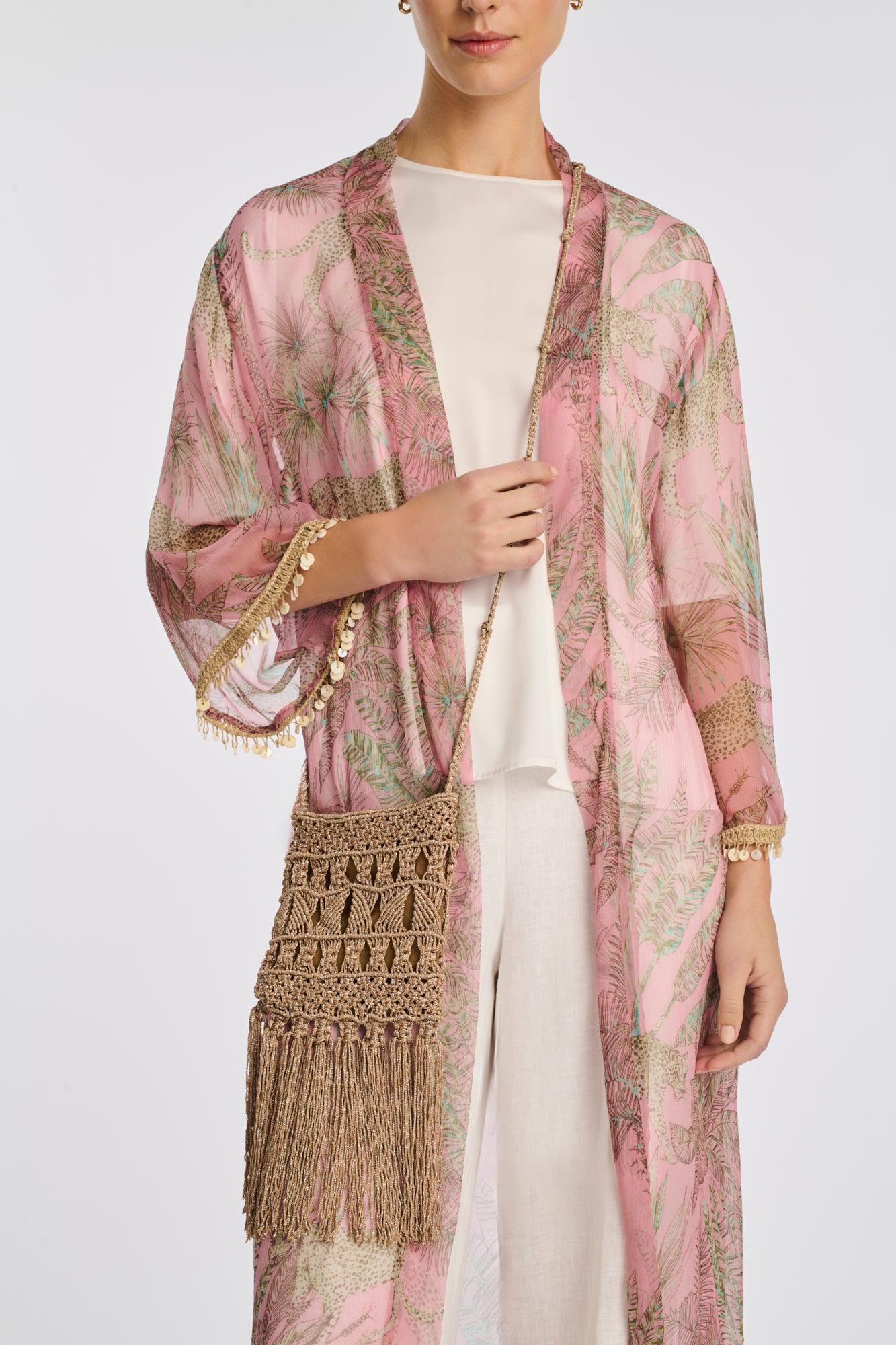 Iridescent crochet clutch bag